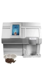 A commercial coffee machine with a digital display, a cup dispensing area, and coffee pods and beans placed in front.