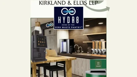 A modern office kitchen with a coffee machine, cereal dispensers, a laptop on a wooden table, and recycling bins, featuring logos for Kirkland & Ellis LLP and HYDR8 Zero Waste Pantry.